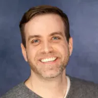 Close-up headshot of Aaron Kronberger