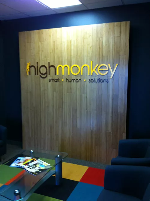 wall with High Monkey logo