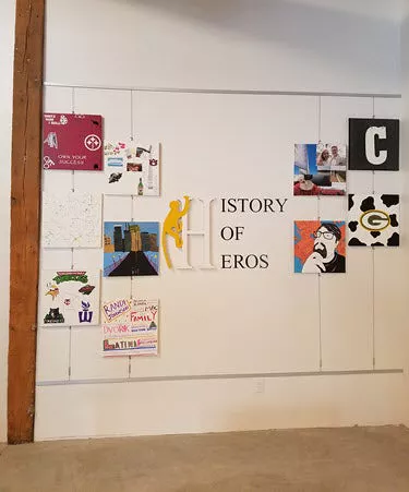 wall with sports teams logos