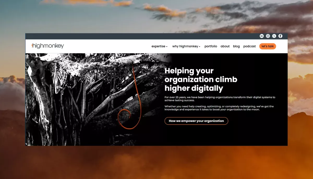 Screenshot of the new HIgh Monkey homepage pasted on top of a cloudy mountain background