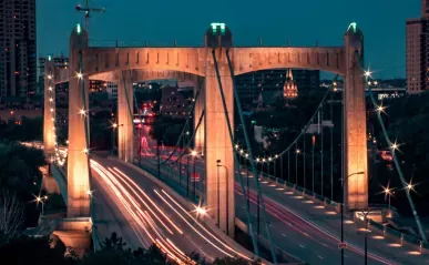 The Hennepin Avenue bridge at nighttime.